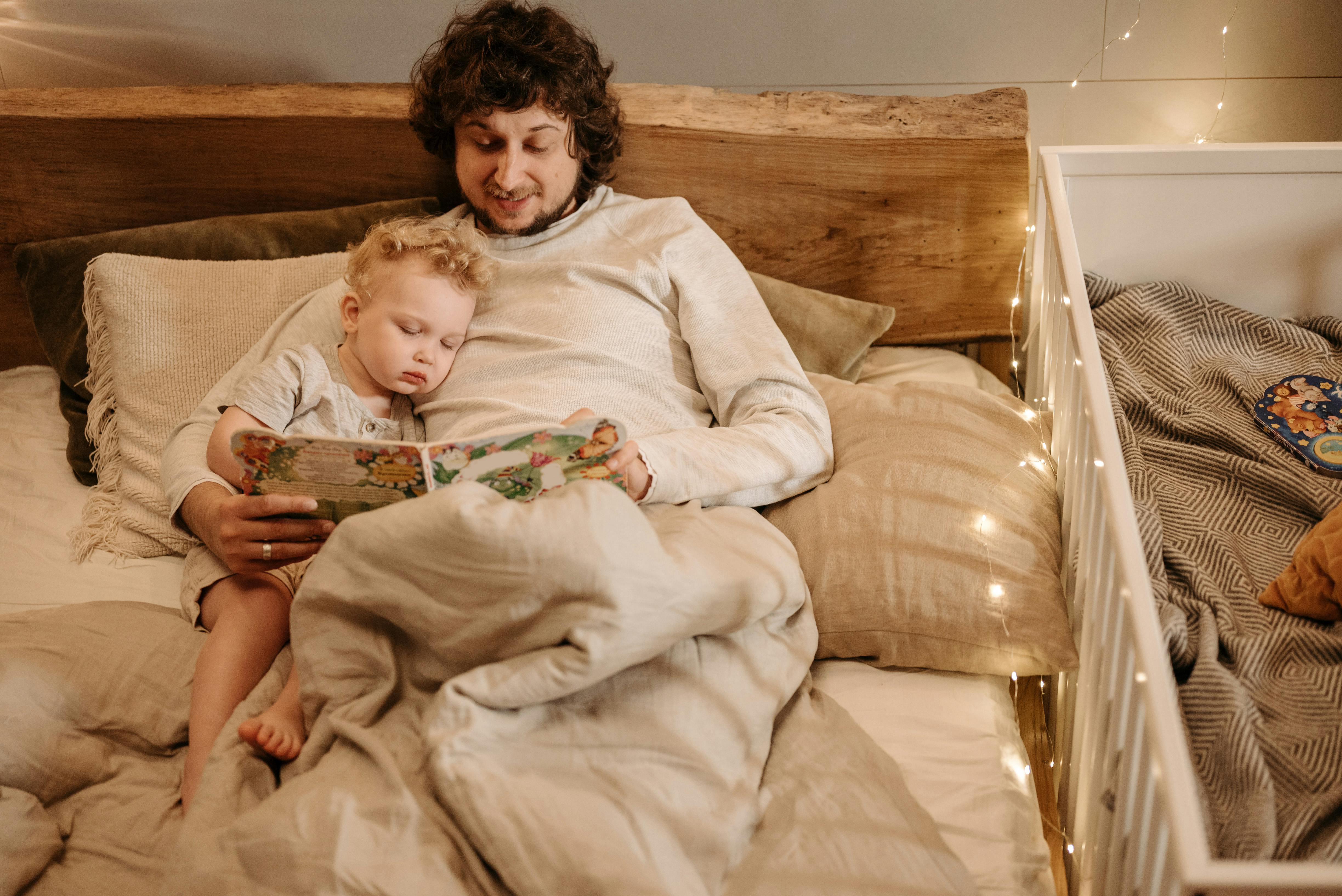 Baby and parent with bedtime story