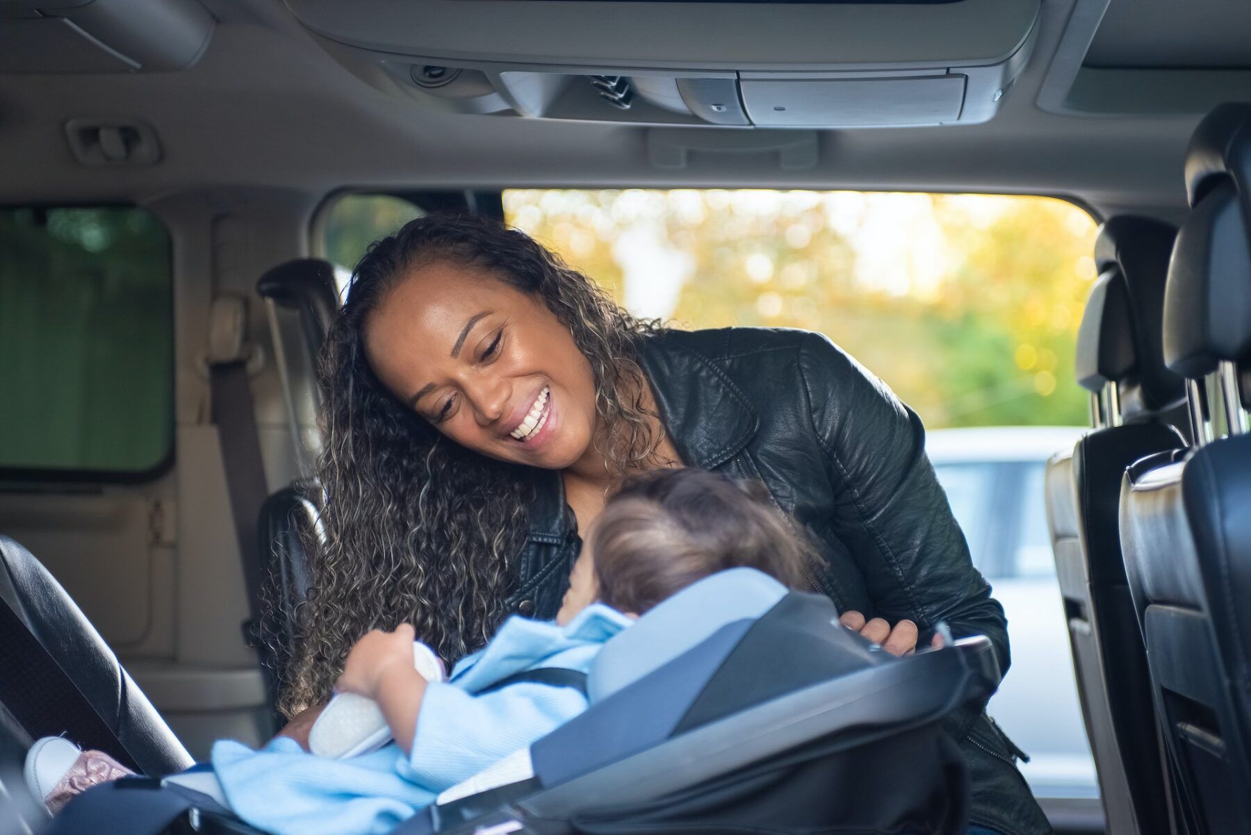 Baby in car seat.