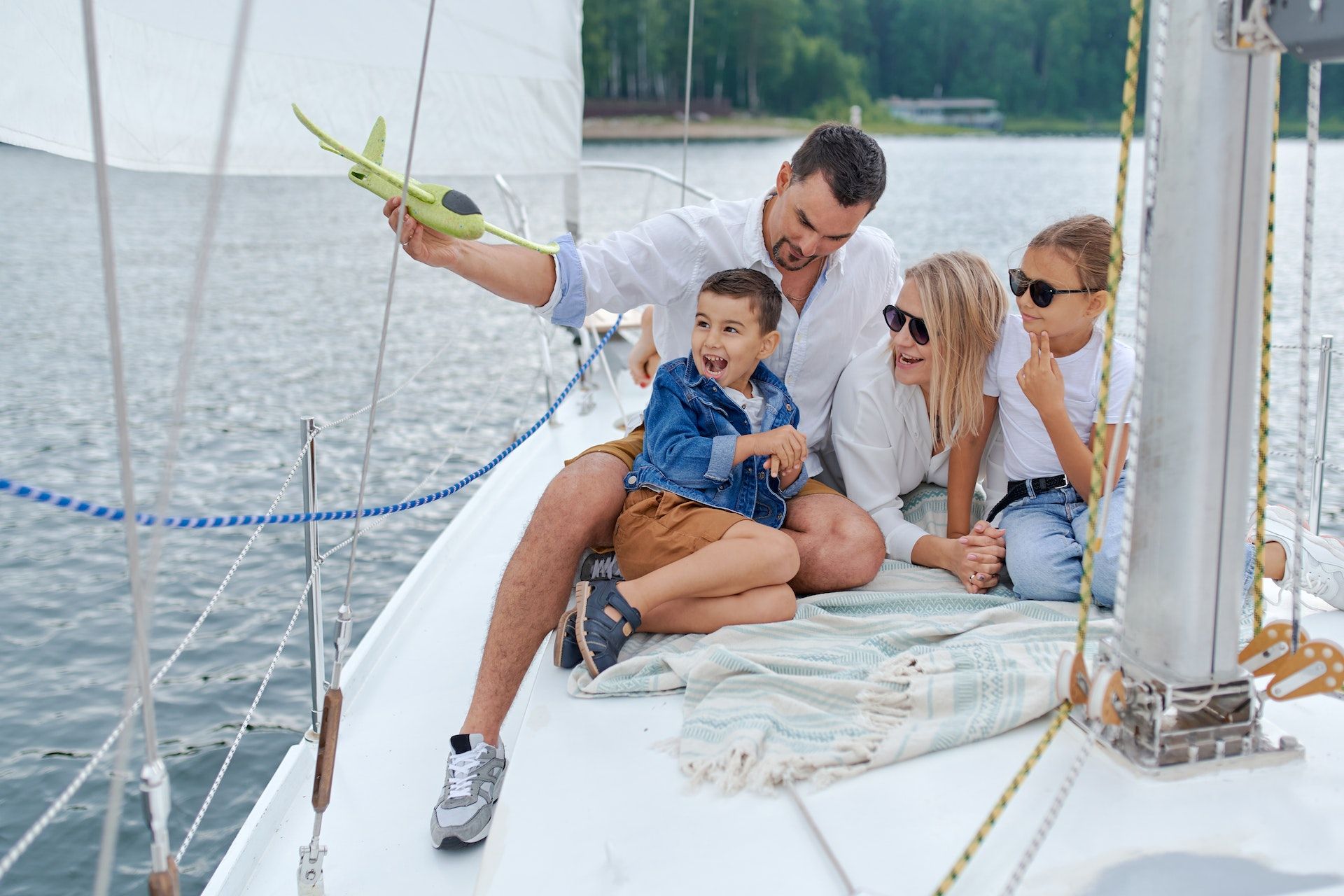 Family on a little boat.