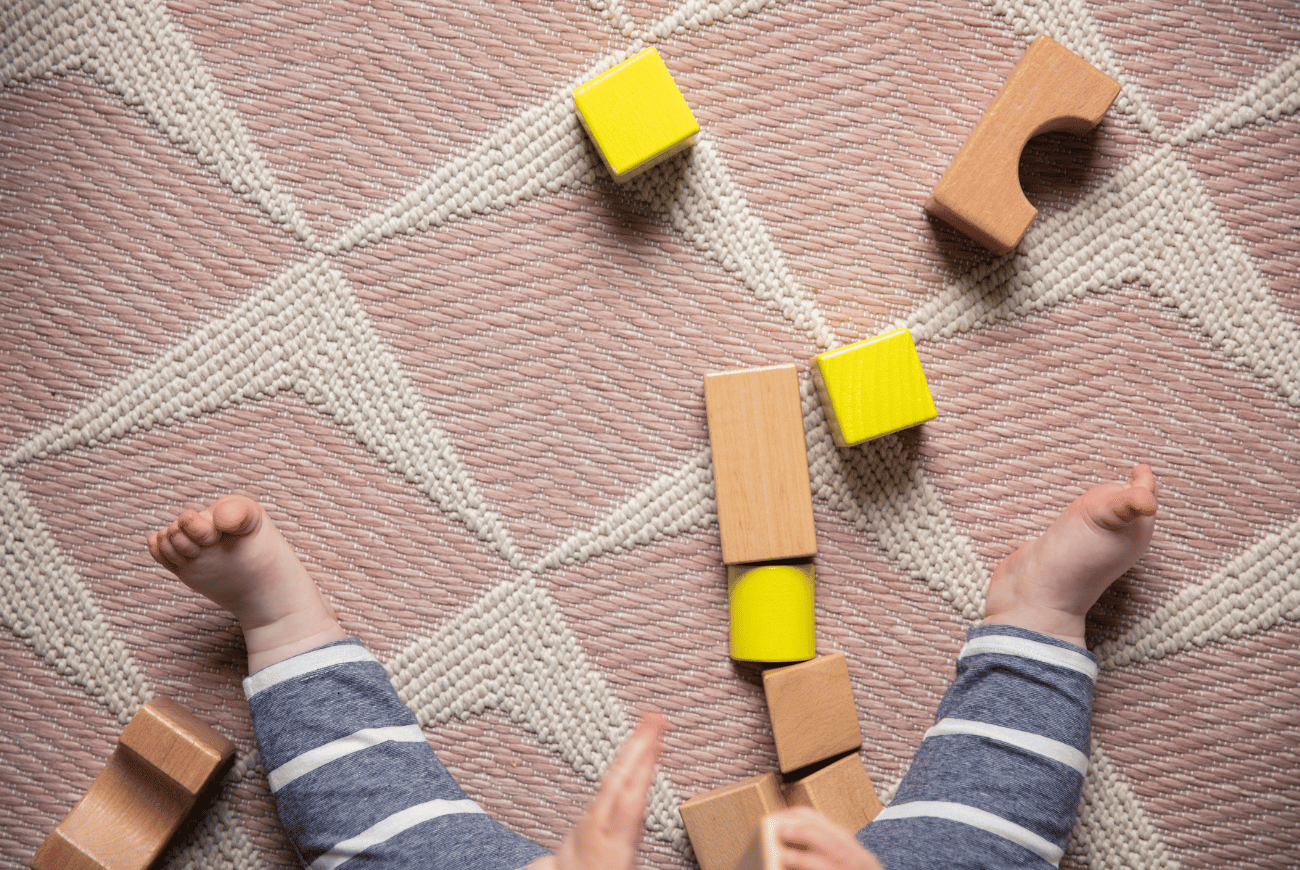 Babies feet and building blocks