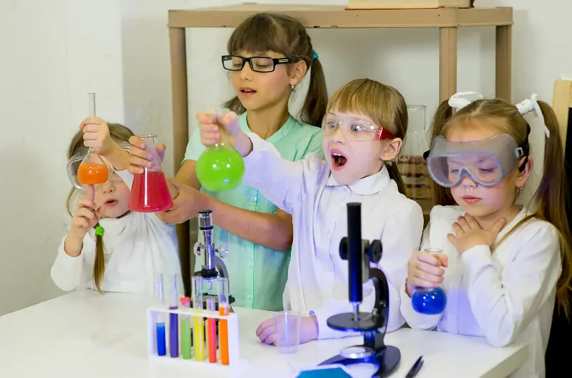 Children reacting to an experiment and very excited.